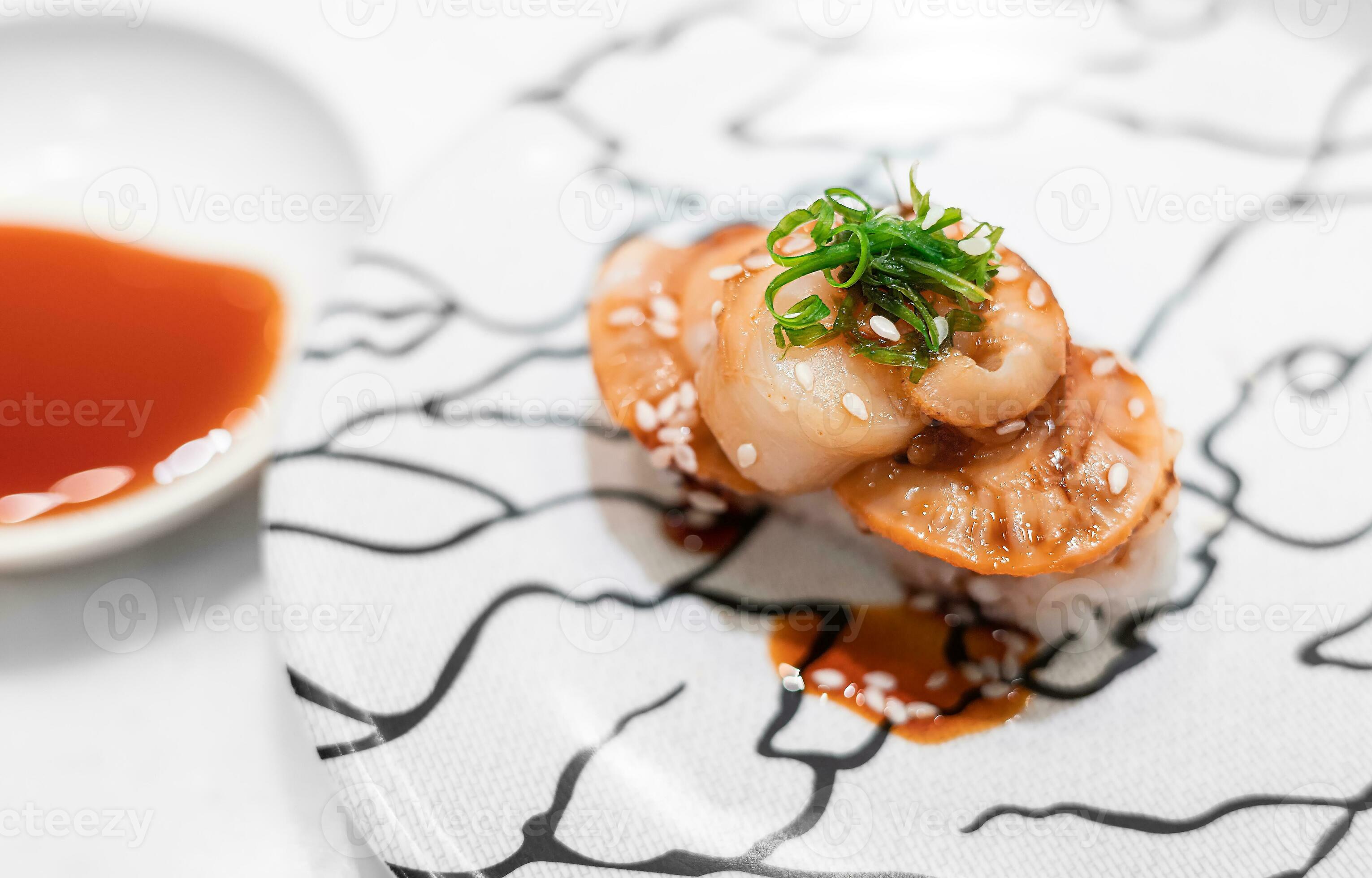 Red clam sushi or ark shell sushi or Akagai sushi serving on white
