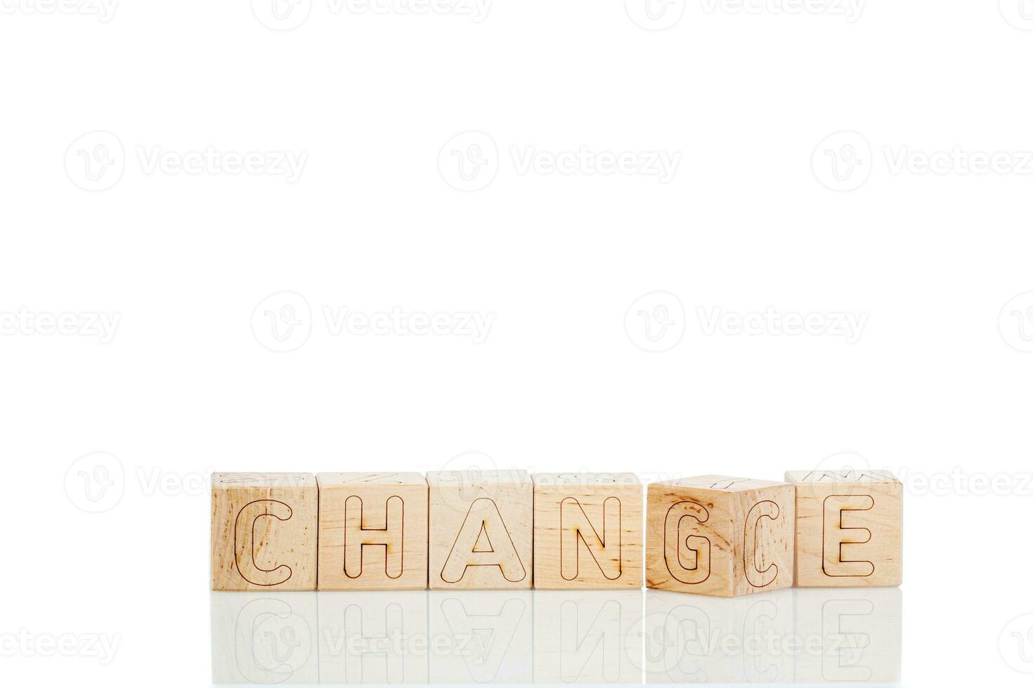 Wooden cubes with letters chance, change on a white background photo