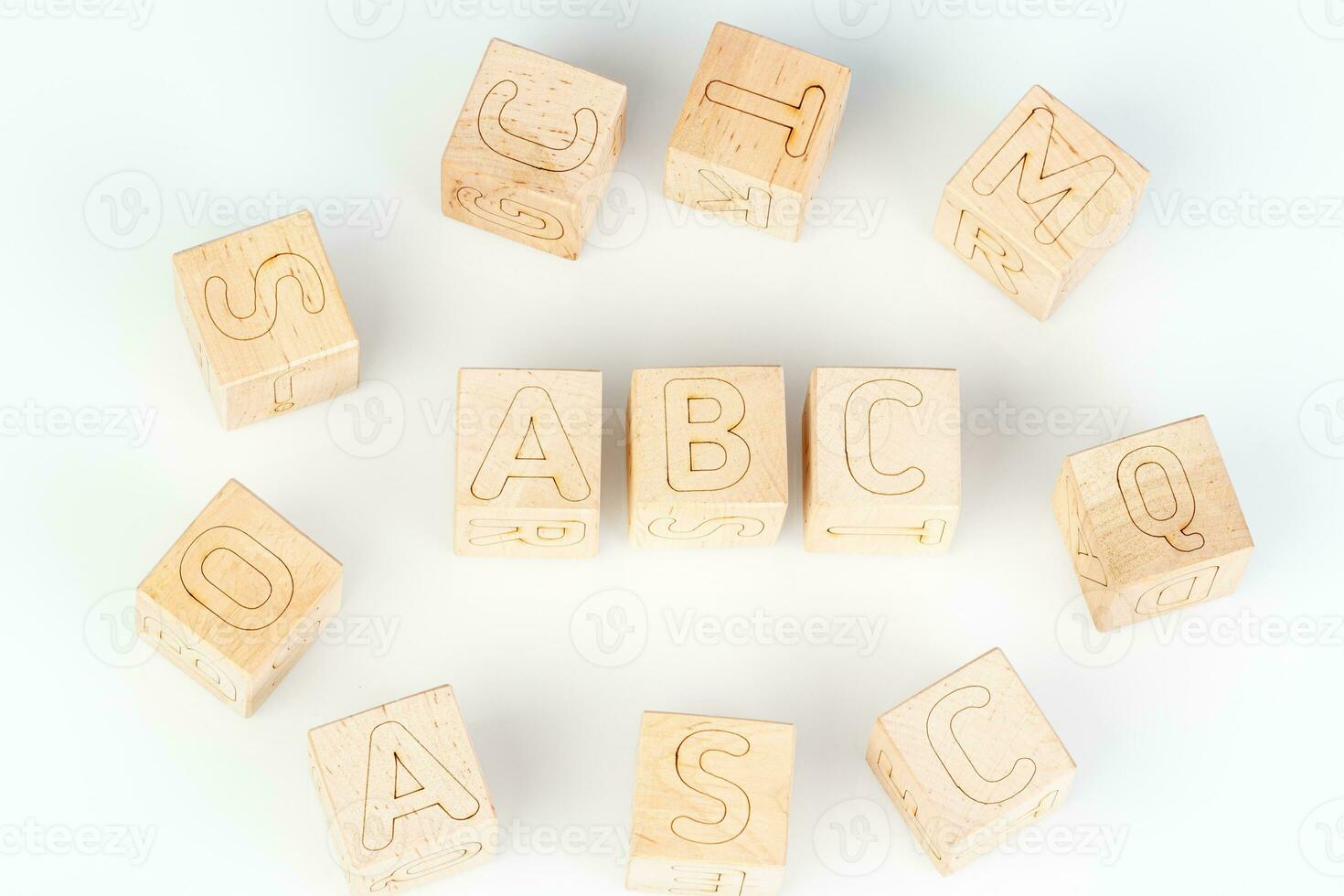 Wooden cubes with letters ABC on a white background photo