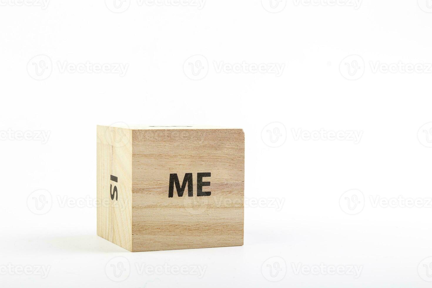 Wooden cubes with the inscription me on a white background photo