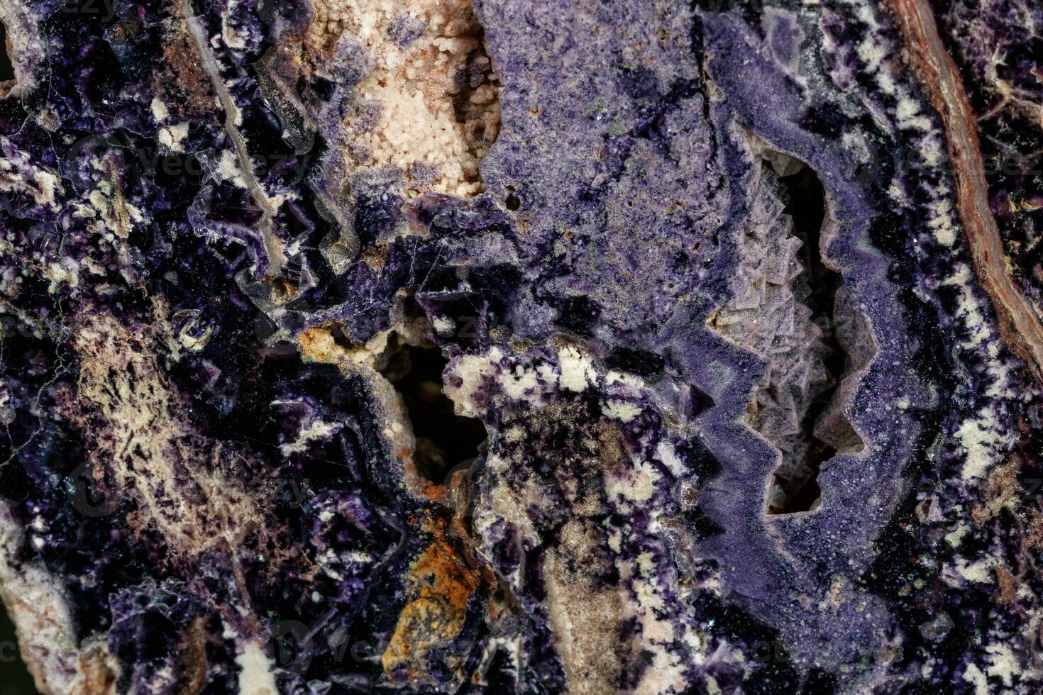 macro stone Fluorite mineral on a black background photo