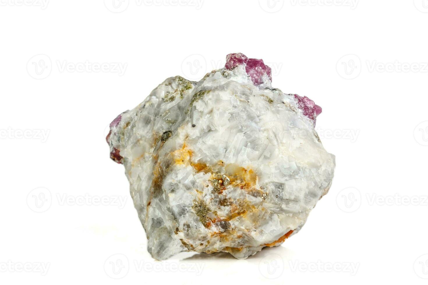 Macro mineral stone Ruby in rock on white background photo