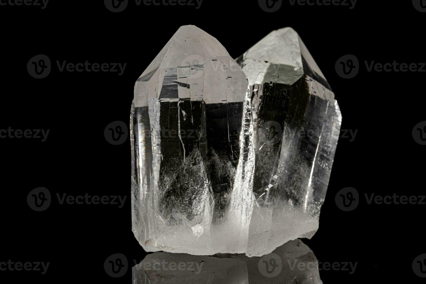 Macro mineral stone rhinestone, rock crystal on a black background photo