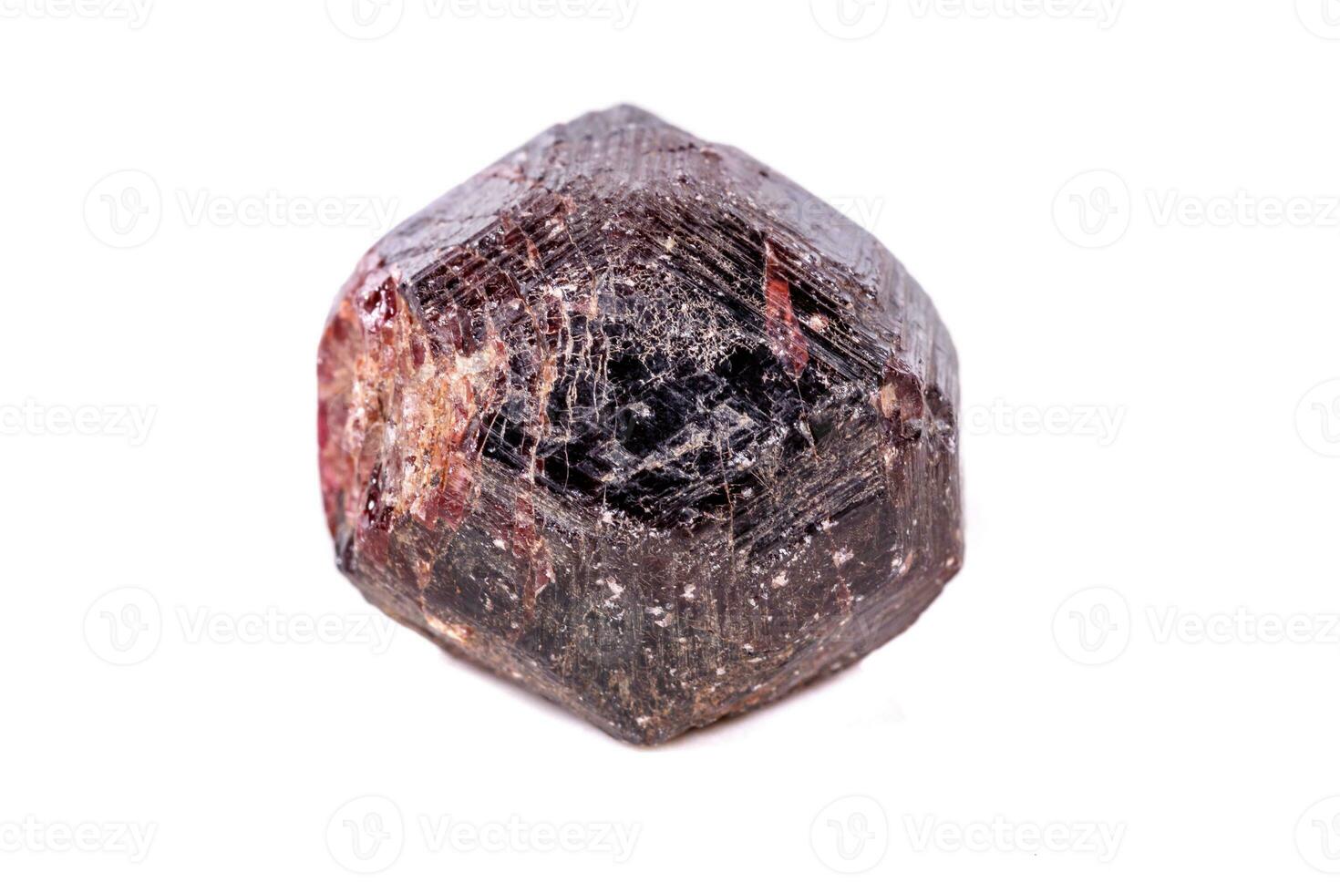 Macro of a mineral garnet stone on a white background photo