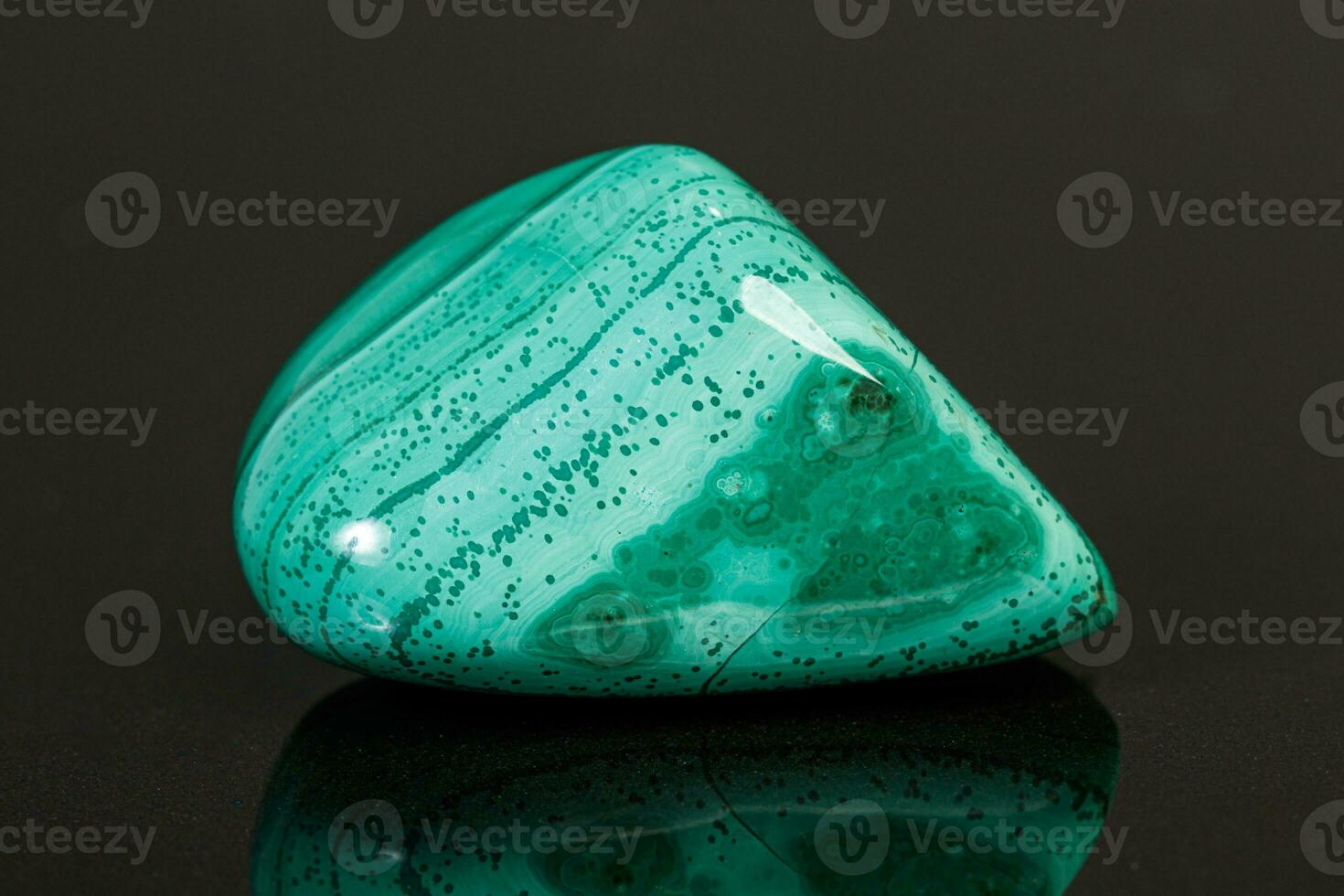 macro mineral stone malachite on a black background photo