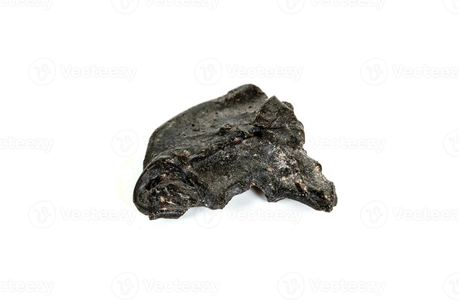 Macro stone mineral meteorite tektite on white background photo