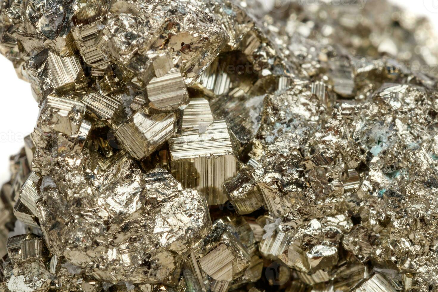 Macro mineral stone Pyrite gold on white background photo