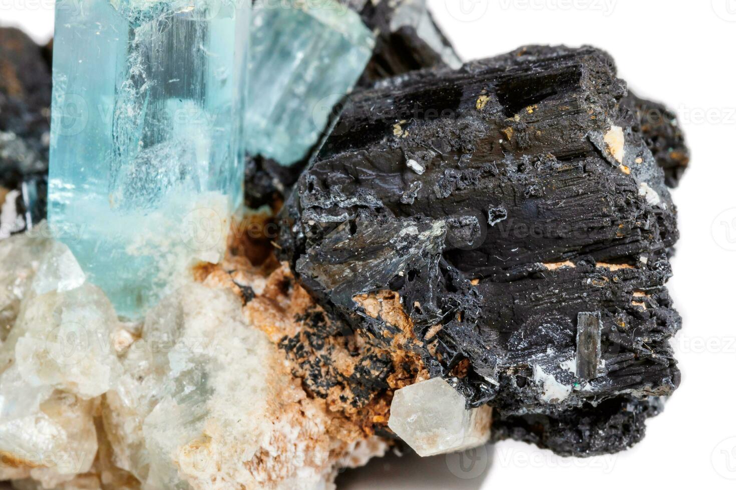 Macro mineral stone Aquamarine and black tourmaline, Schorl on a white background photo