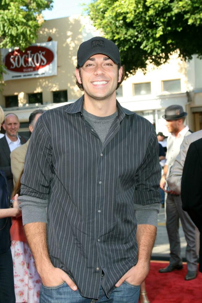 Zachary Levi arriving at the Premiere of Hellboy 2 at the Village Theater in Westwood CA on June 28 2008 photo