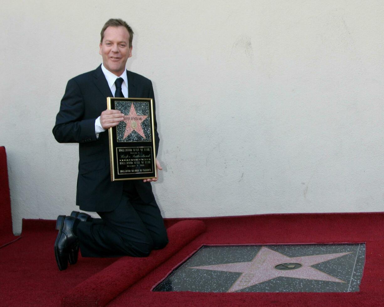 Kiefer Sutherland  Joel Schumacher at the Hollywood Walk of Fame ceremony for Kiefer Sutherland in Hollywood CA December 9 2008 photo