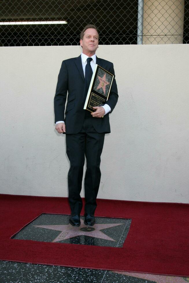 Kiefer Sutherland  Joel Schumacher at the Hollywood Walk of Fame ceremony for Kiefer Sutherland in Hollywood CA December 9 2008 photo