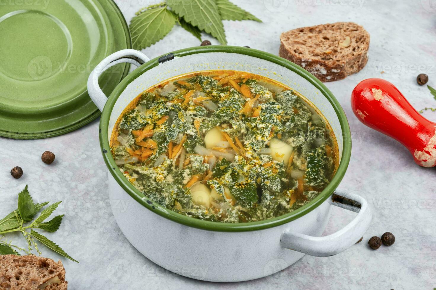 Seasonal fresh nettle soup. photo