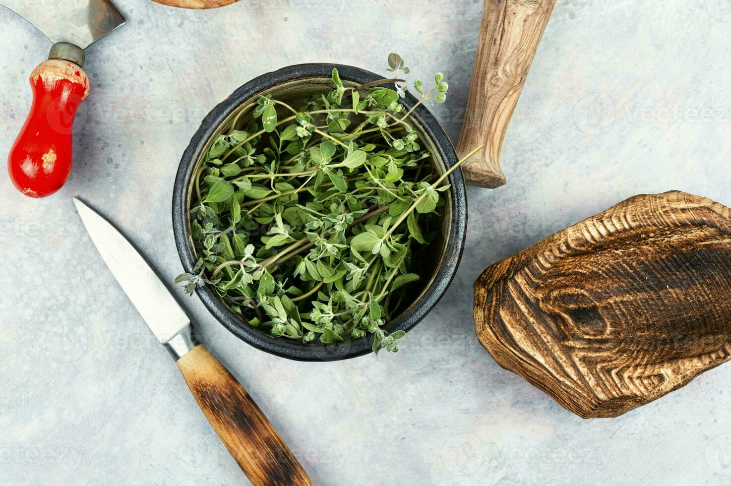 Fresh marjoram leaves on the table. photo