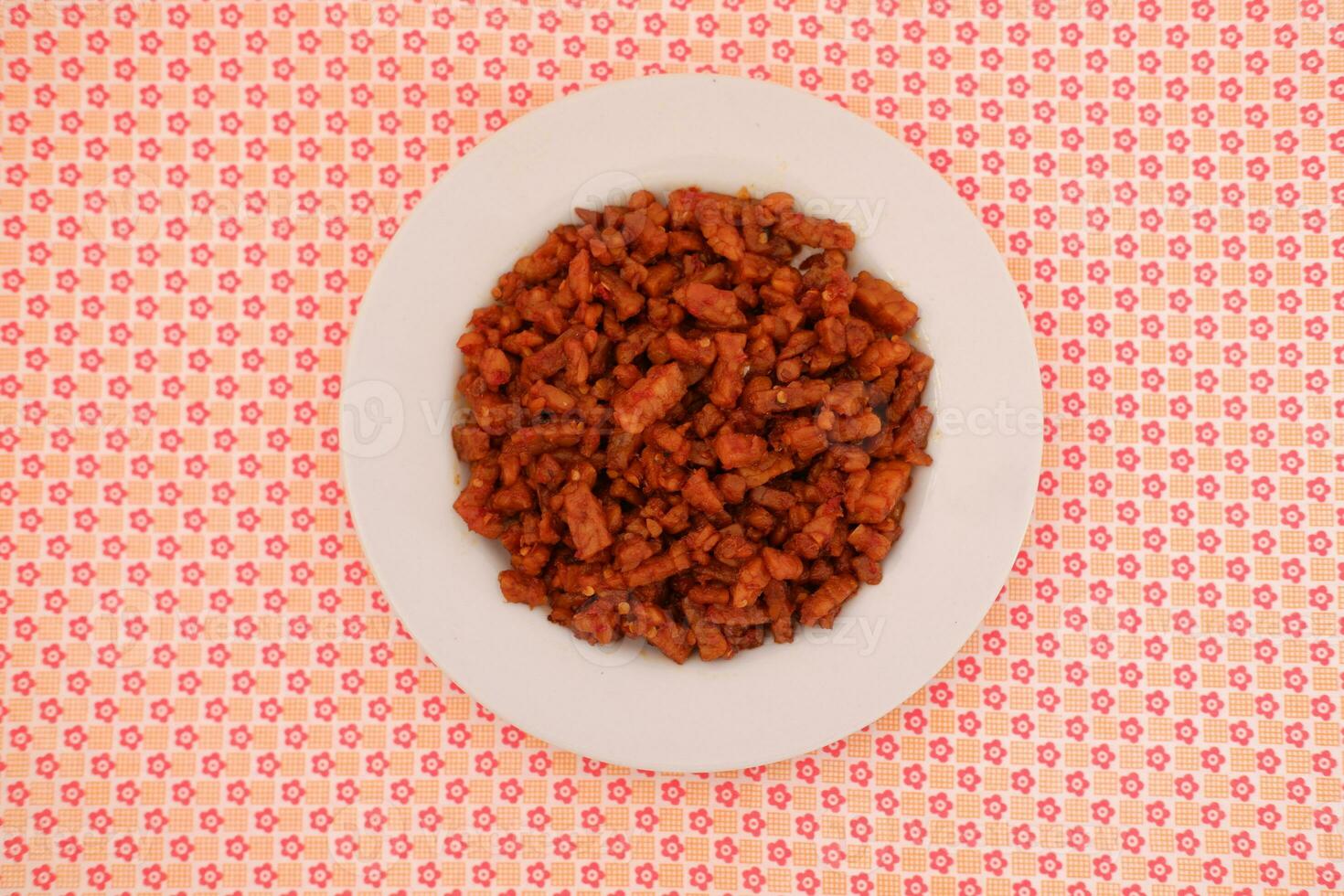 Orek tempe or Sauteed Tempeh is a typical Indonesian cuisine with herbs, garlic, onion, chilli and soy sauce. It tastes delicious photo