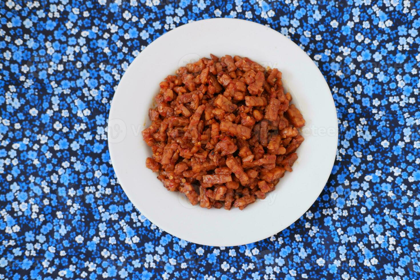 Orek tempe or Sauteed Tempeh is a typical Indonesian cuisine with herbs, garlic, onion, chilli and soy sauce. It tastes delicious photo