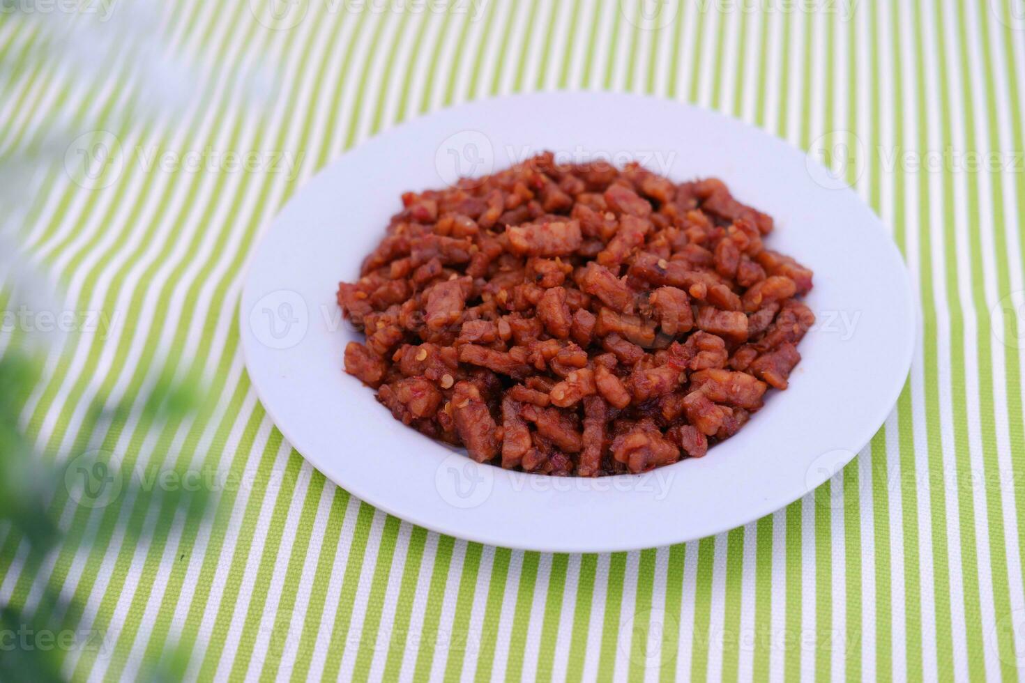 Orek tempe or Sauteed Tempeh is a typical Indonesian cuisine with herbs, garlic, onion, chilli and soy sauce. It tastes delicious photo