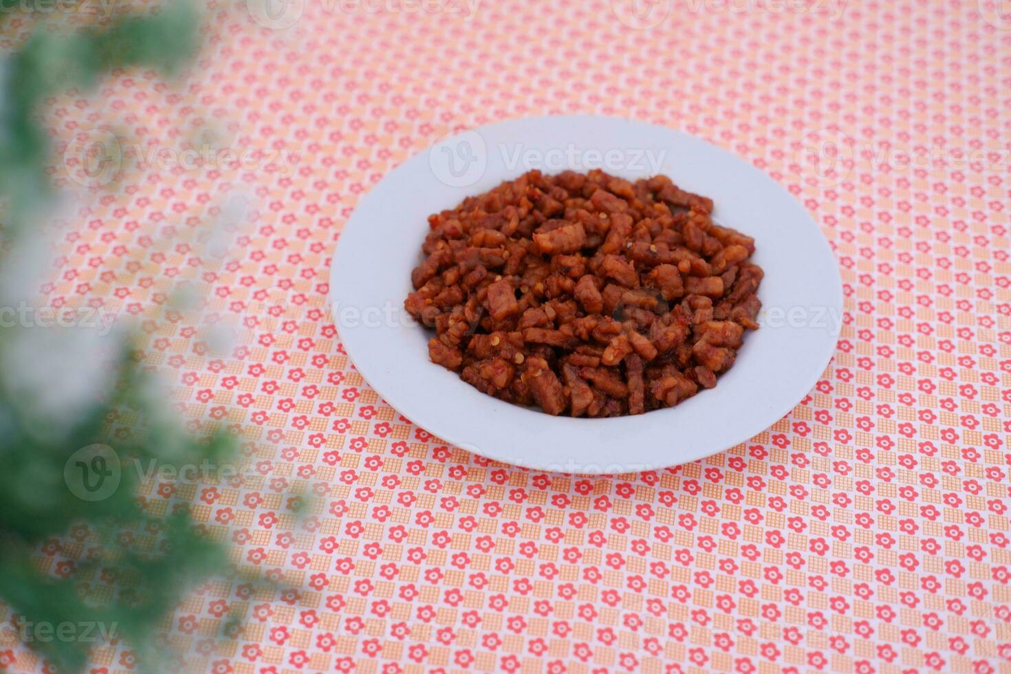 Orek tempe or Sauteed Tempeh is a typical Indonesian cuisine with herbs, garlic, onion, chilli and soy sauce. It tastes delicious photo