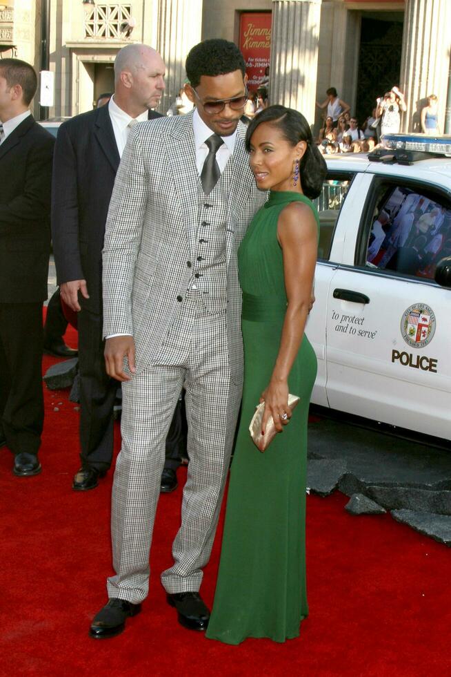 Will Smith  Jada Pinkett Smith arriving at Graumans Chinese Theater for the premiere of Hancock in Los Angeles CA on June 30 2008 photo