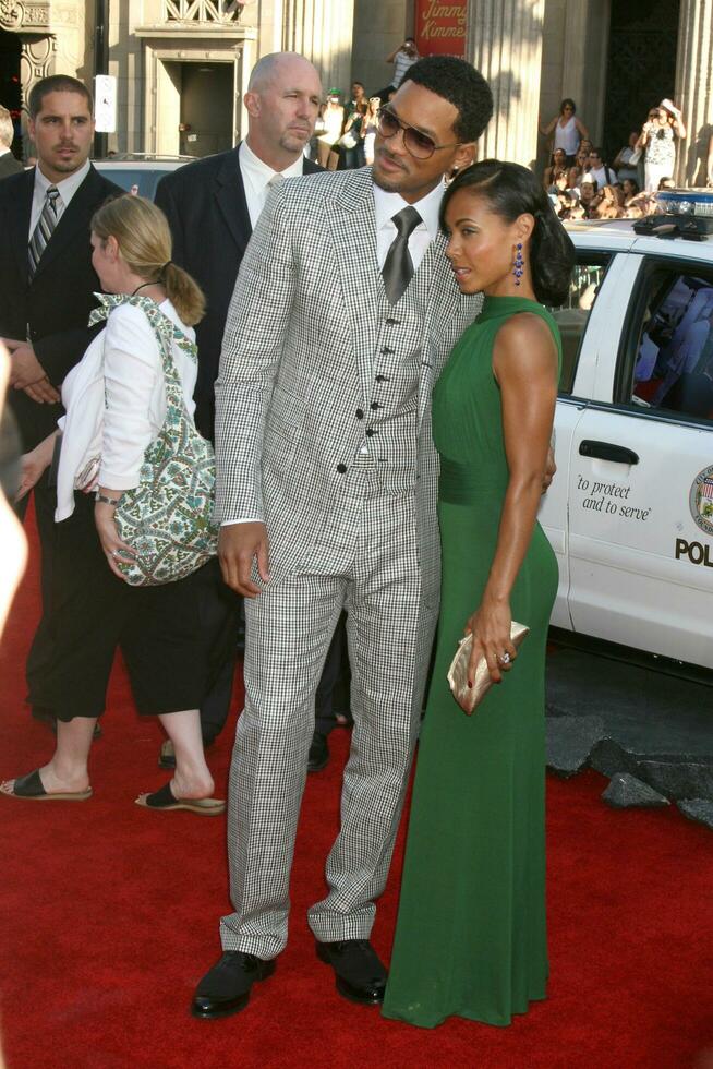 Will Smith  Jada Pinkett Smith arriving at Graumans Chinese Theater for the premiere of Hancock in Los Angeles CA on June 30 2008 photo