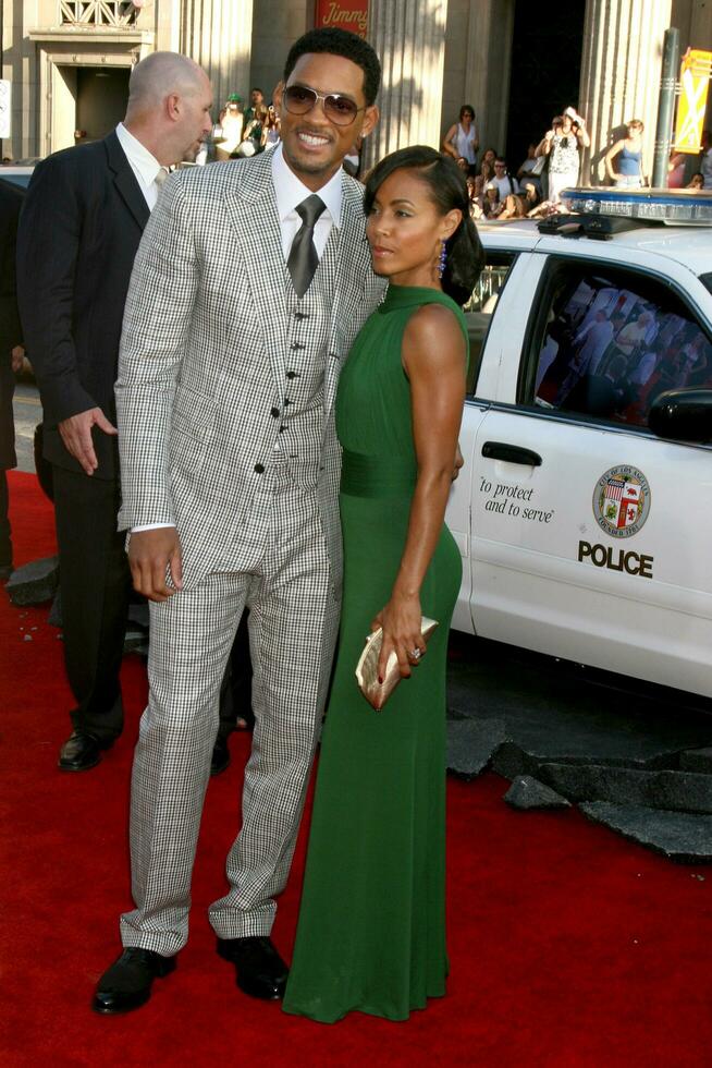 Will Smith  Jada Pinkett Smith arriving at Graumans Chinese Theater for the premiere of Hancock in Los Angeles CA on June 30 2008 photo