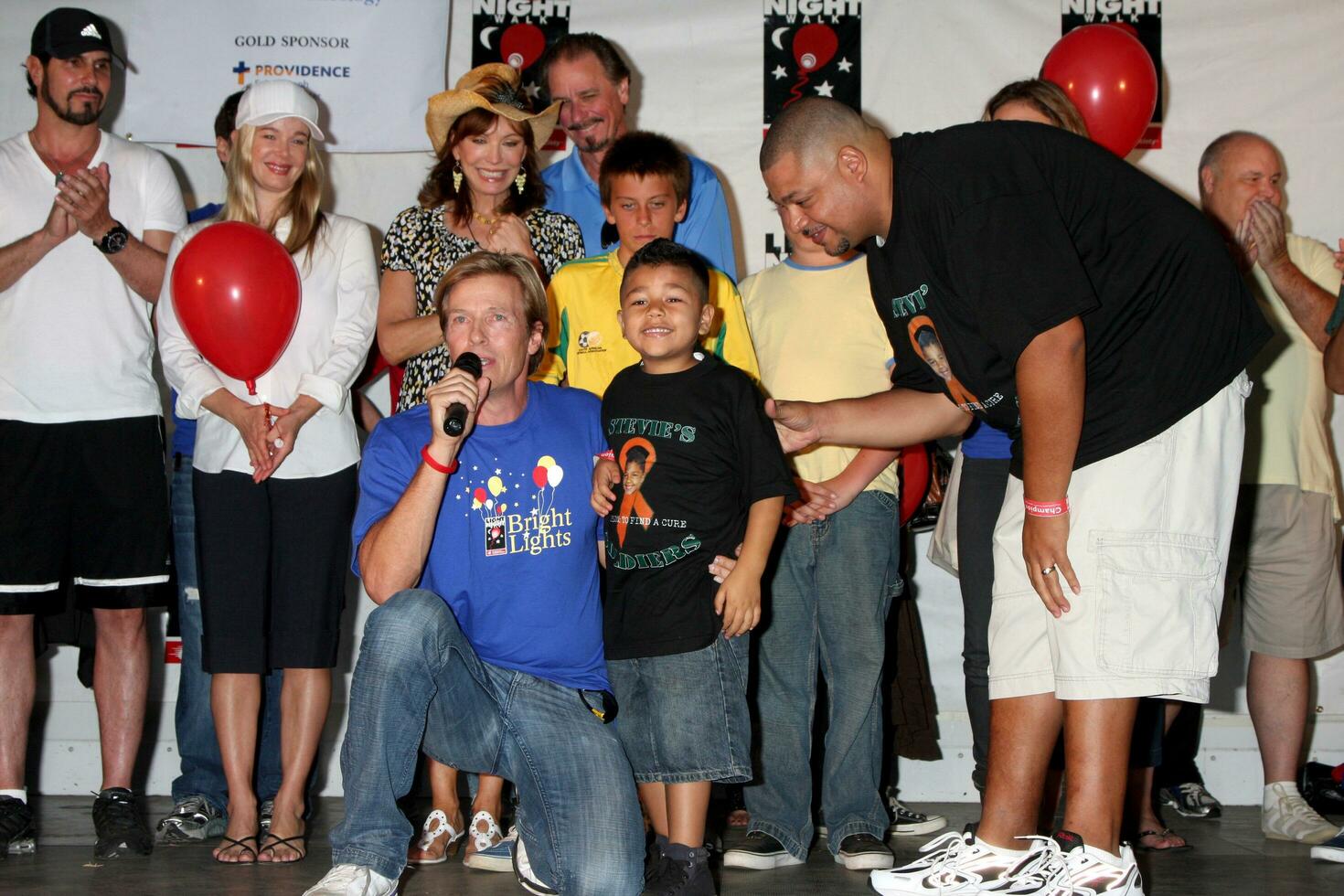 LOS ANGELES, OCT 2 - Jack Wagner and Stevie, a child survivor at the  Light the Night Walk  to benefit the Leukemia and Lymphoma Society at Griffith Park on October 2, 2010 in Los Angeles, CA photo