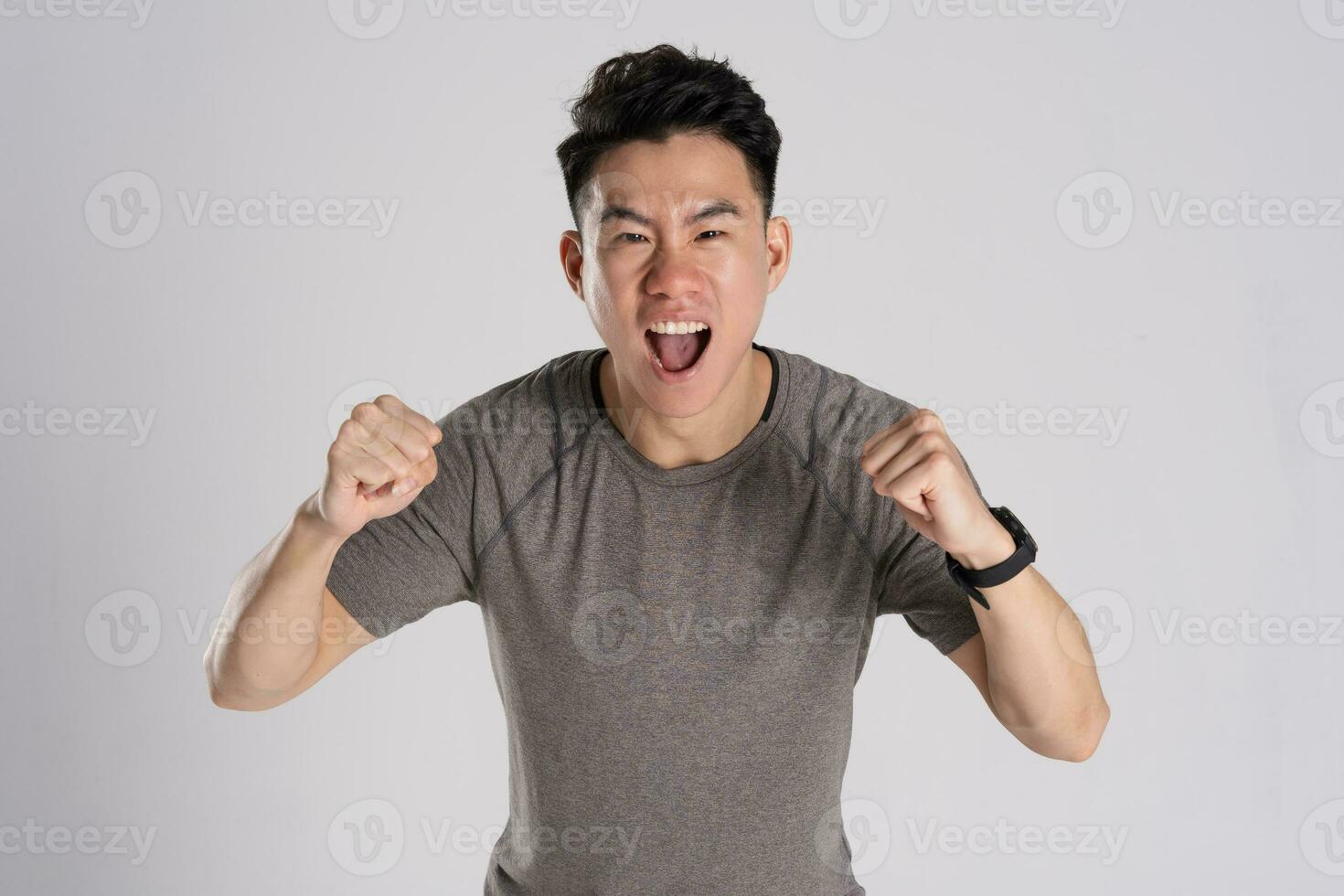 Image of Asian man exercising on white background photo