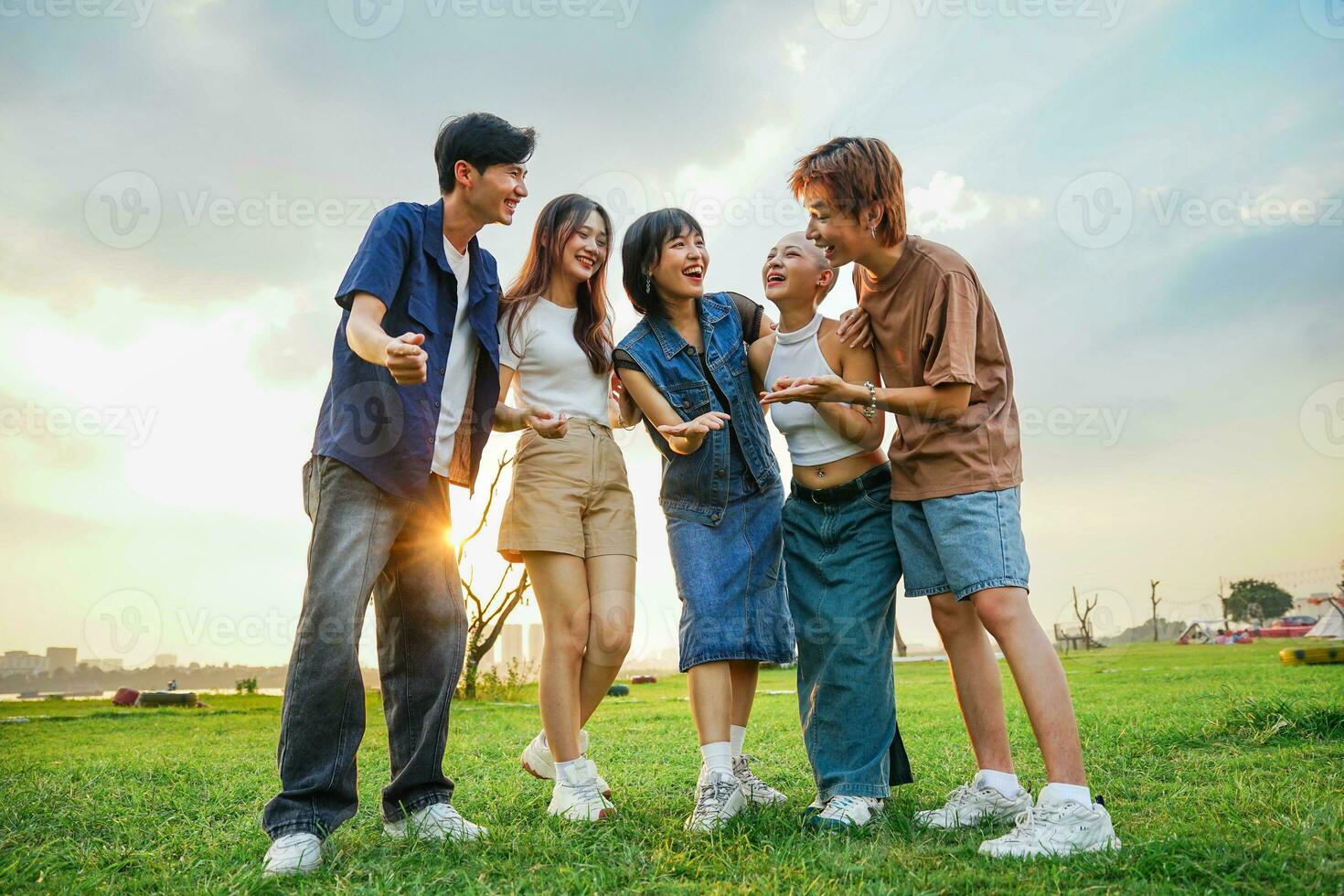 Image of a group of young Asian people laughing happily together photo