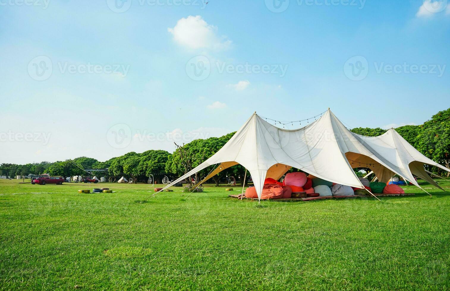 Image of beautiful camping lawn and clear blue sky photo