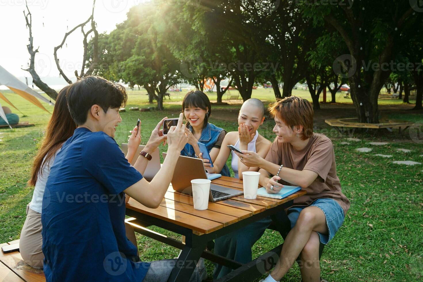 Image of a group of Asian students studying together photo