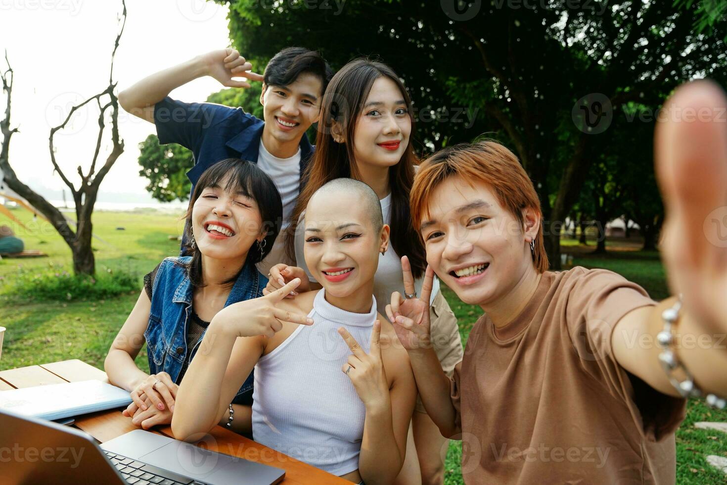 Image of a group of Asian students studying together photo