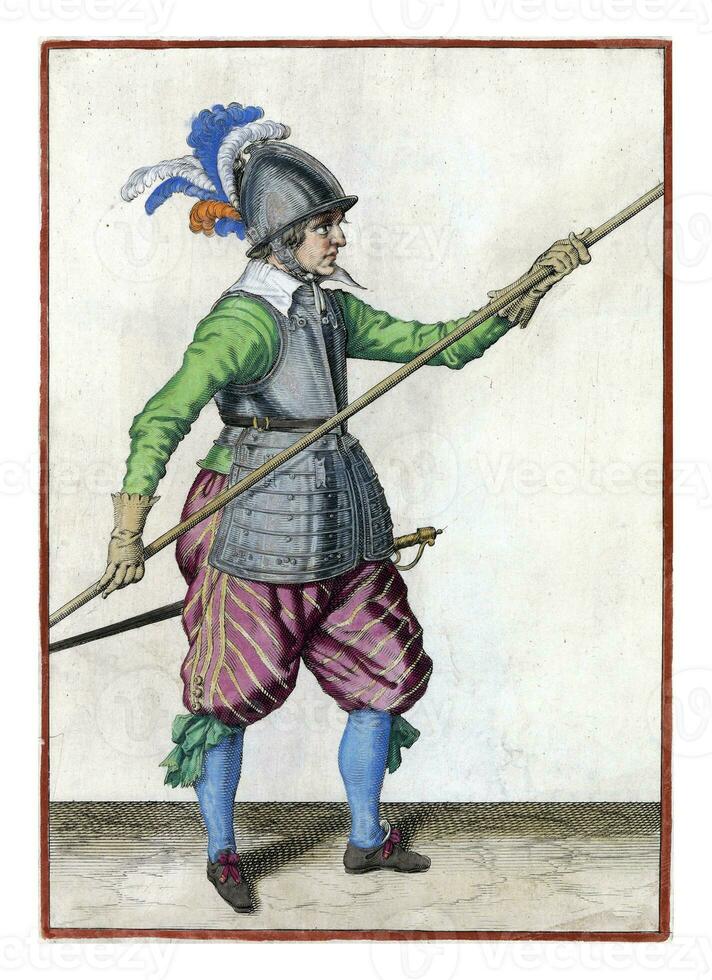 Soldier extending his spear by transferring his right hand from the tip to the base of the weapon photo