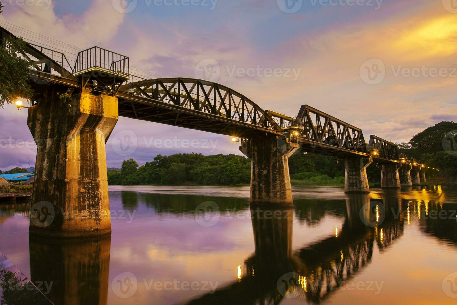 death railway bridge crossing river  khwae in kanchanaburi one of important historical traveling site thailand photo