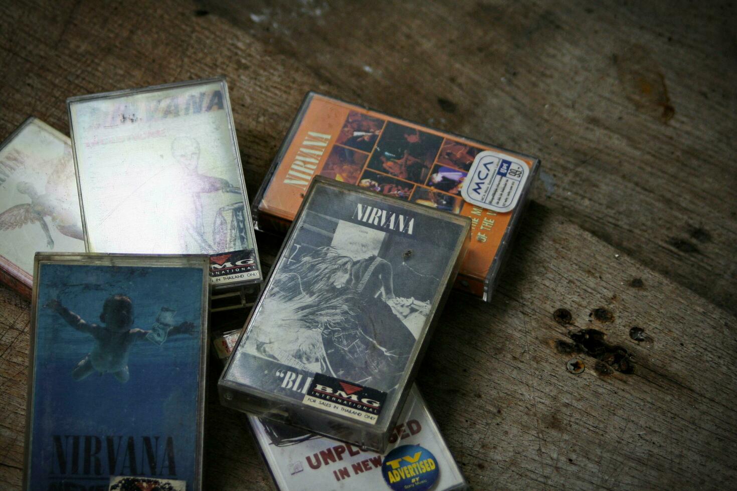 America, Washington State  September 08 2023  Nirvana cassette tape on wooden floor, Nirvana band, Kurt Cobain, Nirvana songs, In Uthro photo