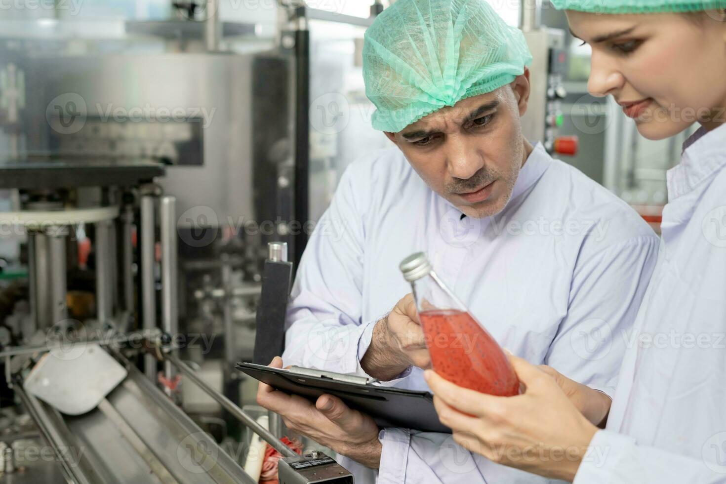 quality inspector food or beverages technician inspection about quality control food or beverages before send product to the customer. Production leader recheck ingredient and productivity. photo