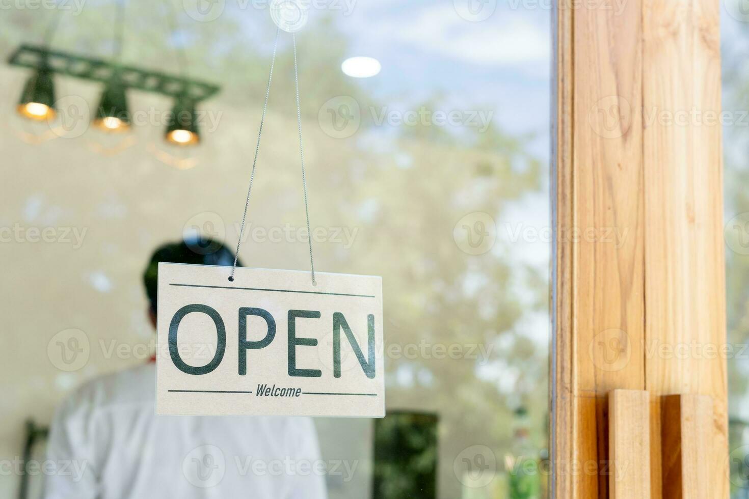 open on the first day of business. guarantees safety, cleanliness, open the coffee shop. open for New normal. Small business, welcome, restaurant, home made photo
