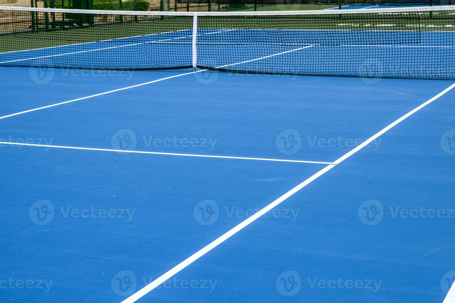 Whole blue tennis court, synthetic rubber lawn photo