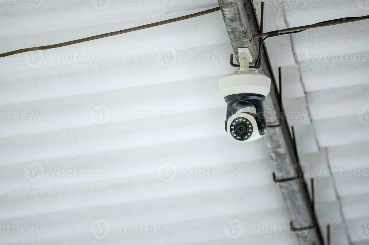 Surveillance camera CCTV setting on ceiling photo