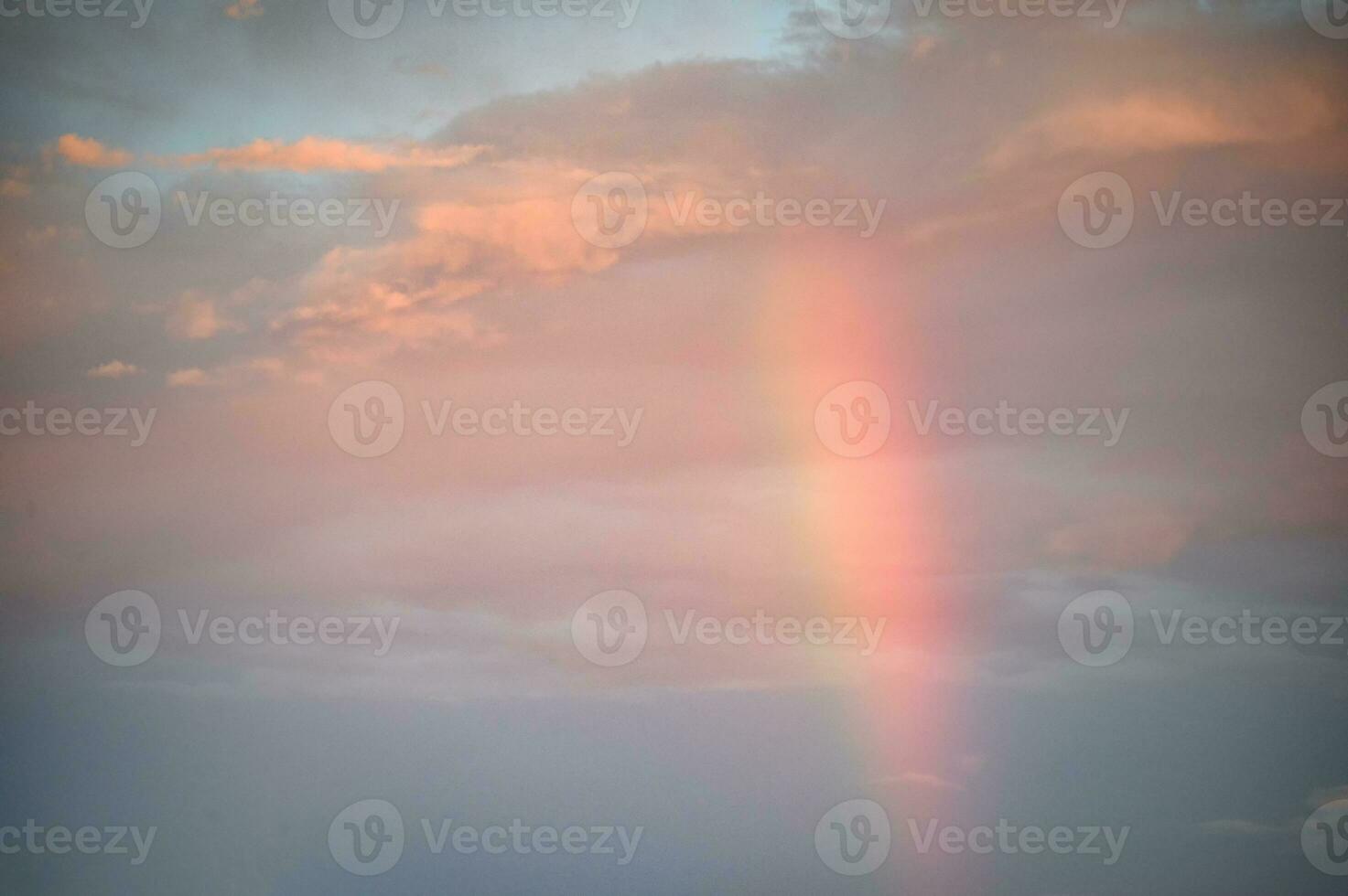 Rainbow in the sky at evening photo