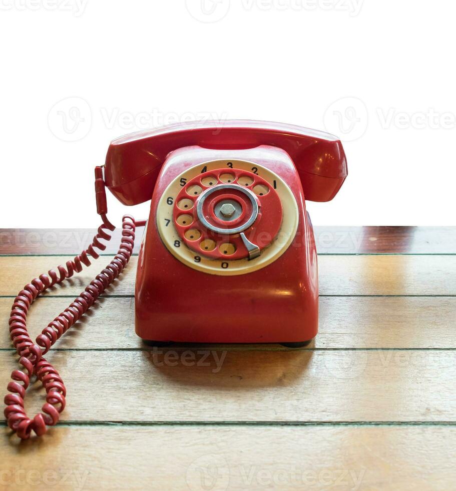 Red telephone vintage old style on table photo