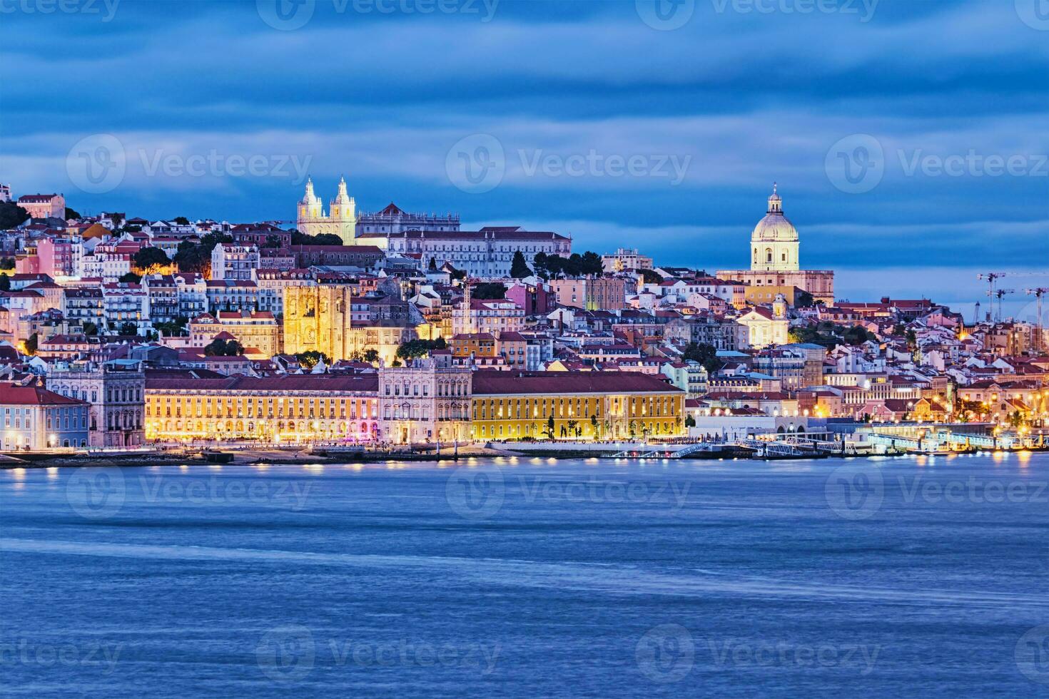 View of Lisbon view over Tagus river with yachts and boats in the evening. Lisbon, Portugal photo