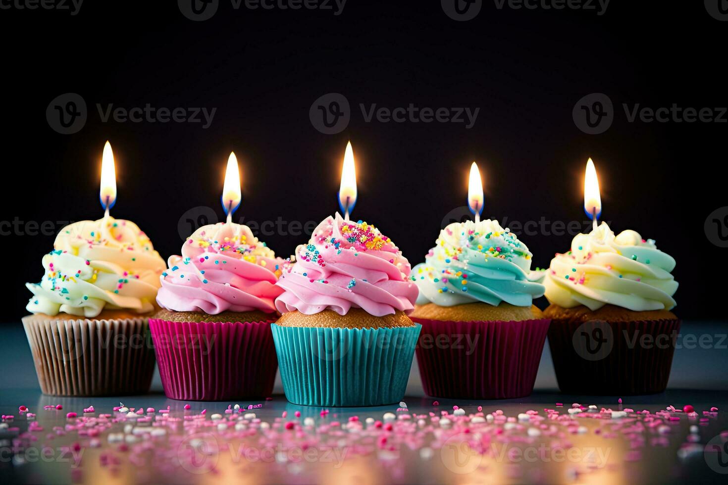 Generative AI, Row of colorful birthday cupcakes with candle of each, on light pink background photo