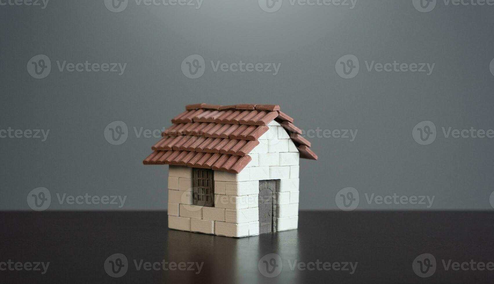 Model of the house. Property insurance. Design and architectural services. Real estate market review. Construction industry. Buying and selling housing. photo