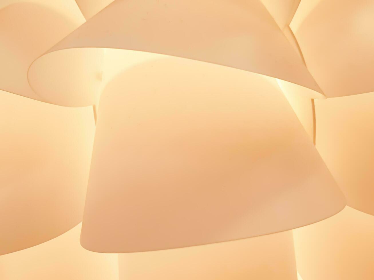 Closeup and crop abstract decorative home lantern background with shape and yellow lights refection. photo