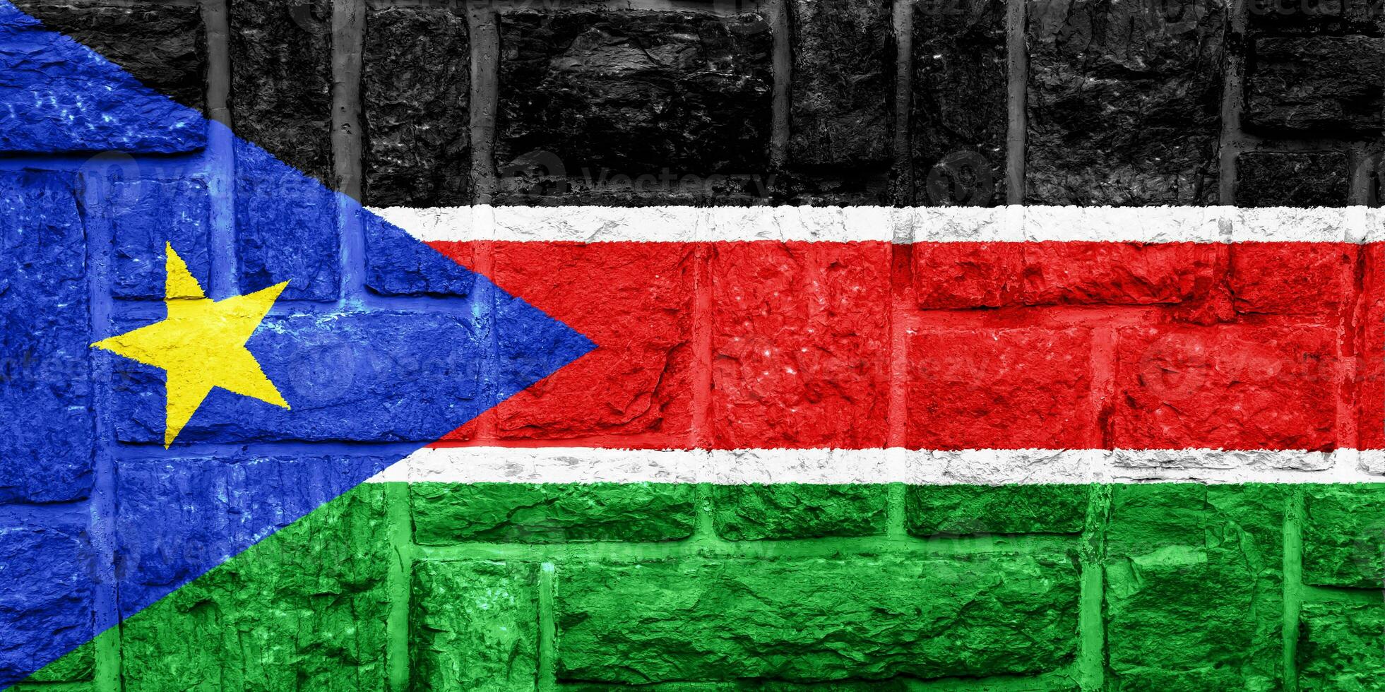 Flag of Republic of South Sudan on a textured background. Concept collage. photo