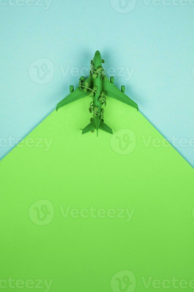 Sustainable aviation concept - green plane. Banner image, copy space. photo