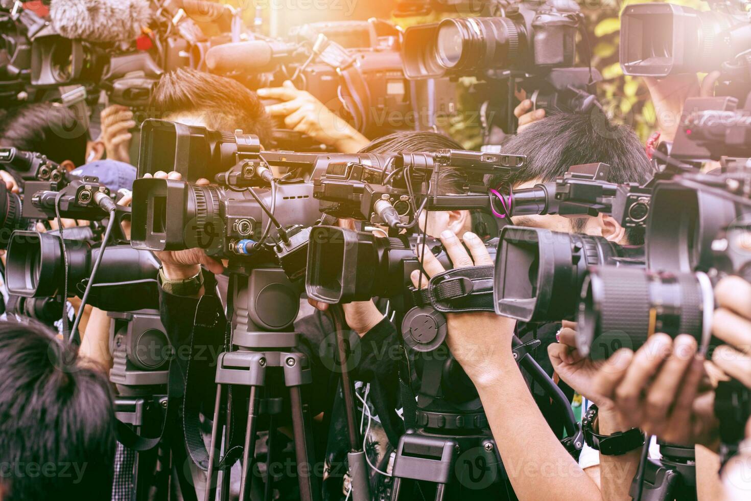 large number of press and media reporter in broadcasting event photo