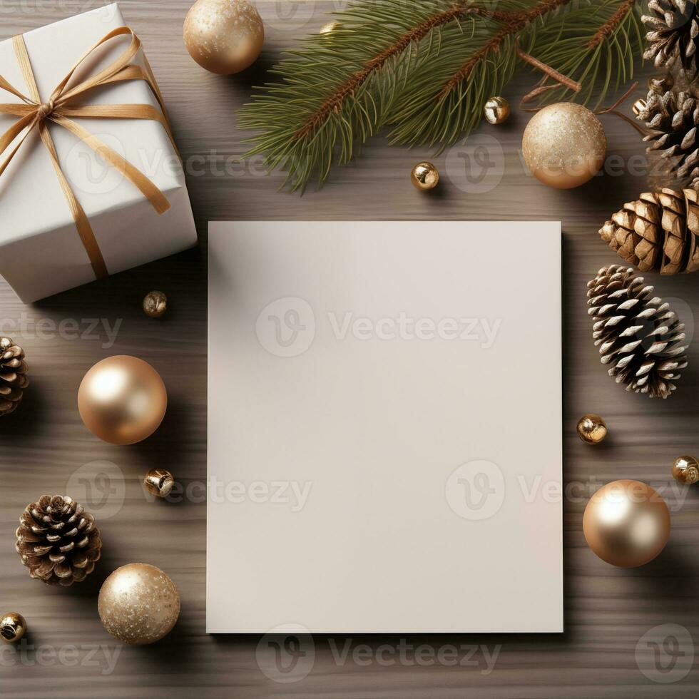 Christmas gift, card, pinecone, leaves on a table background. Top view, copy space. Mockup greeting card merry Christmas and happy new year photo