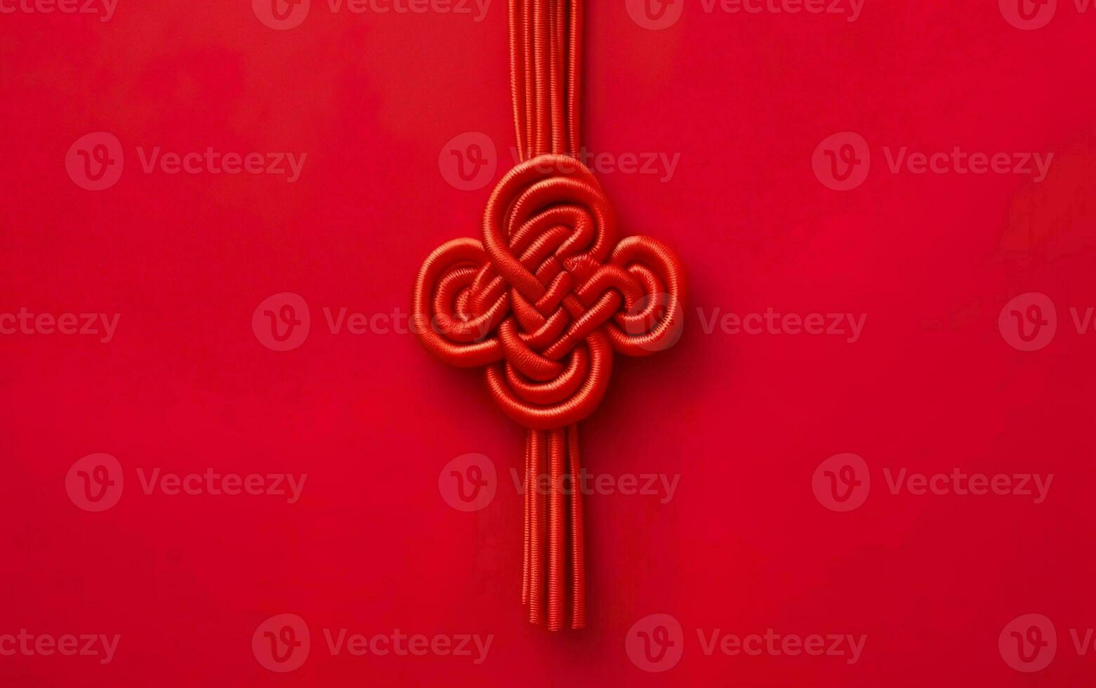 Chinese style symmetrical ornament, a red knot isolated on red background. Symbol of good luck. AI Generative photo