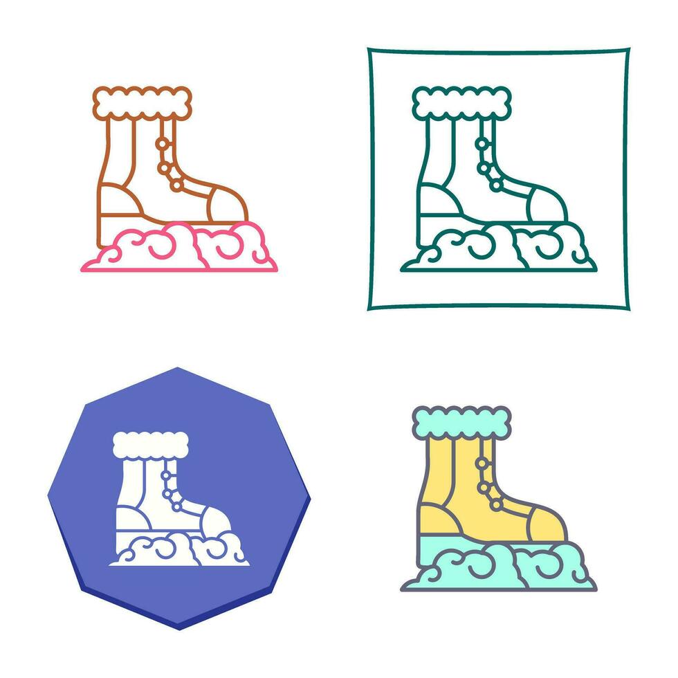 icono de vector de botas de nieve