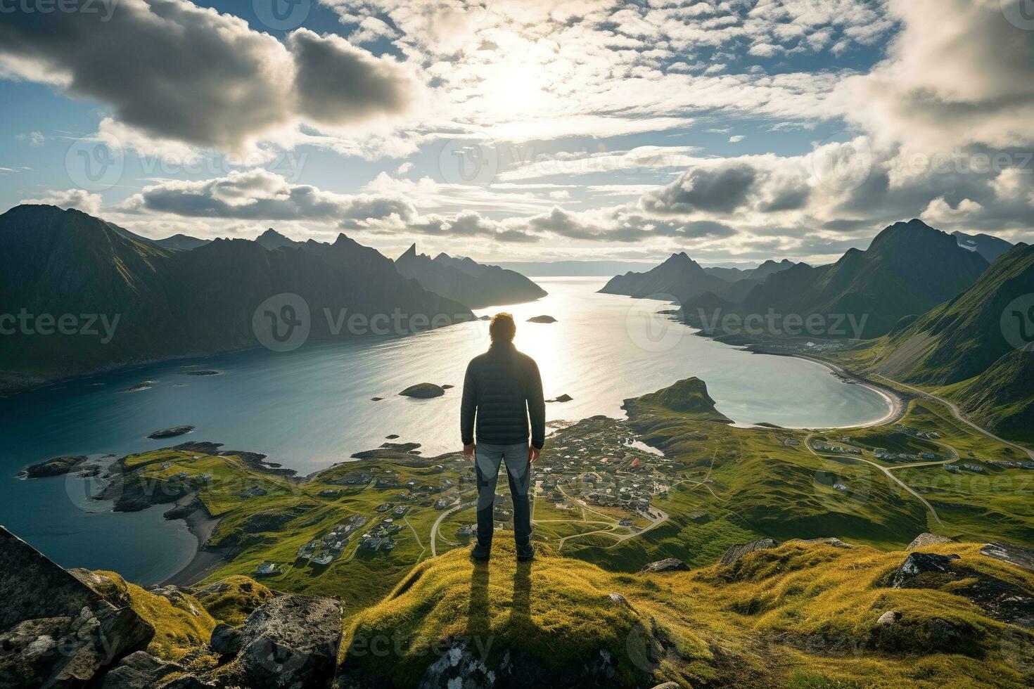 Man standing on the top of a mountain and enjoying the view AI generated photo